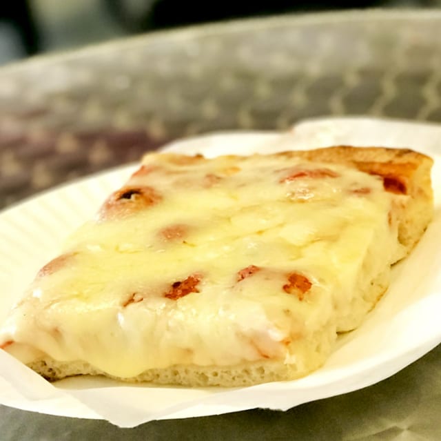Our Famous Sicilian Pizza Slice.
