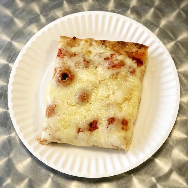 Our Famous Sicilian Pizza Slice.